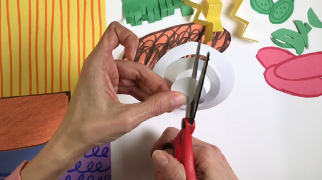 Cutting an onion out of Prang Construction paper