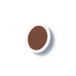 A small, round white container filled with a brown liquid, viewed from above against a white background.