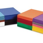 The Medium Weight Construction Paper is neatly arranged in two stacks, showcasing a vibrant array of colors including blue, white, black, red, orange, purple, green, yellow, brown and pink.